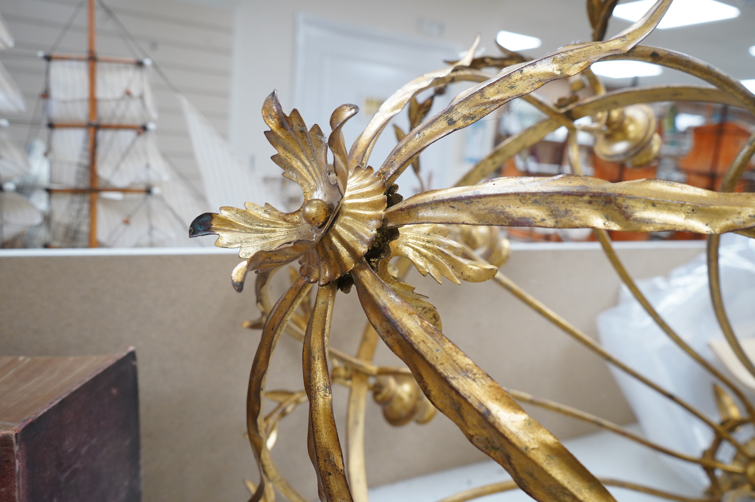 A gilt metal eight light basket chandelier, 86cm